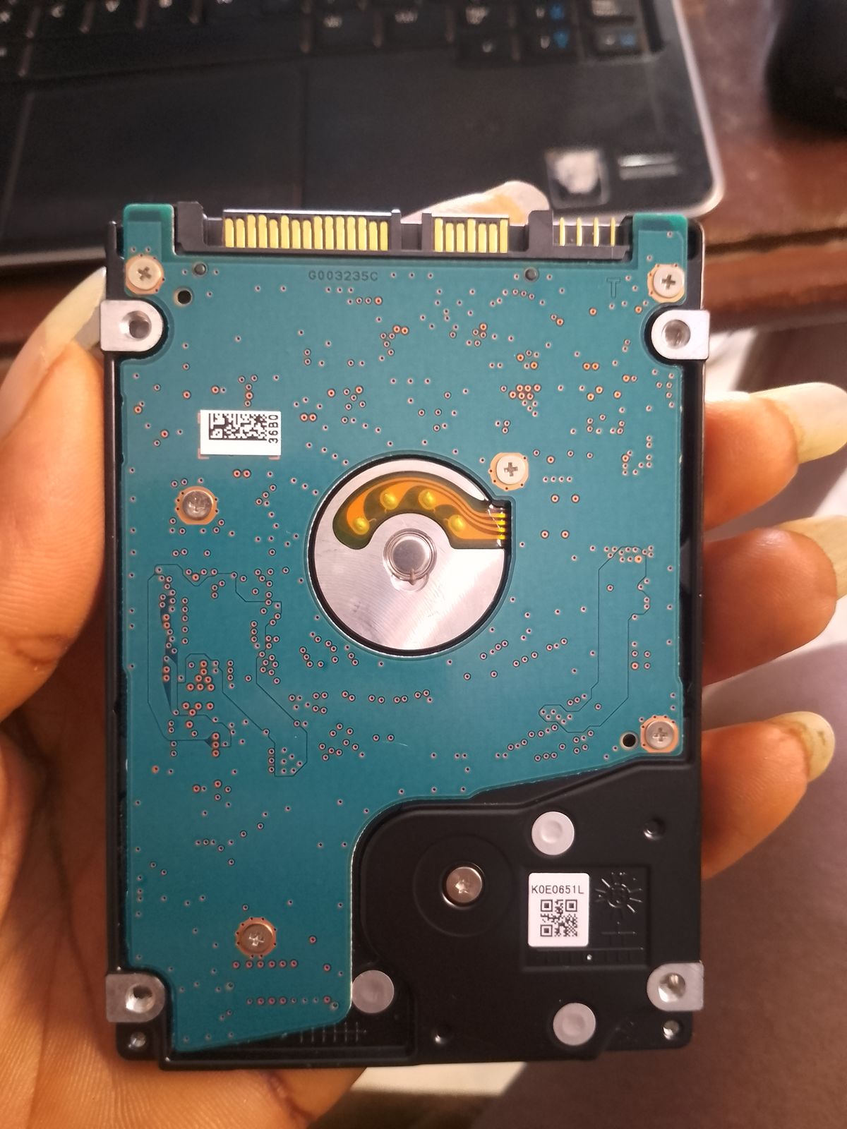 Hitachi hard drive being diagnosed